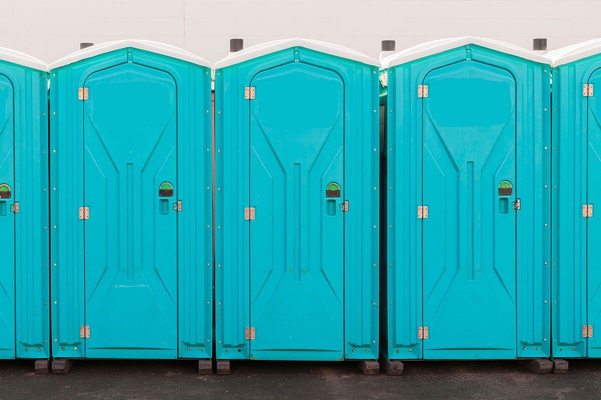 Industrial portable restroom units at a plant in Geneva, New York